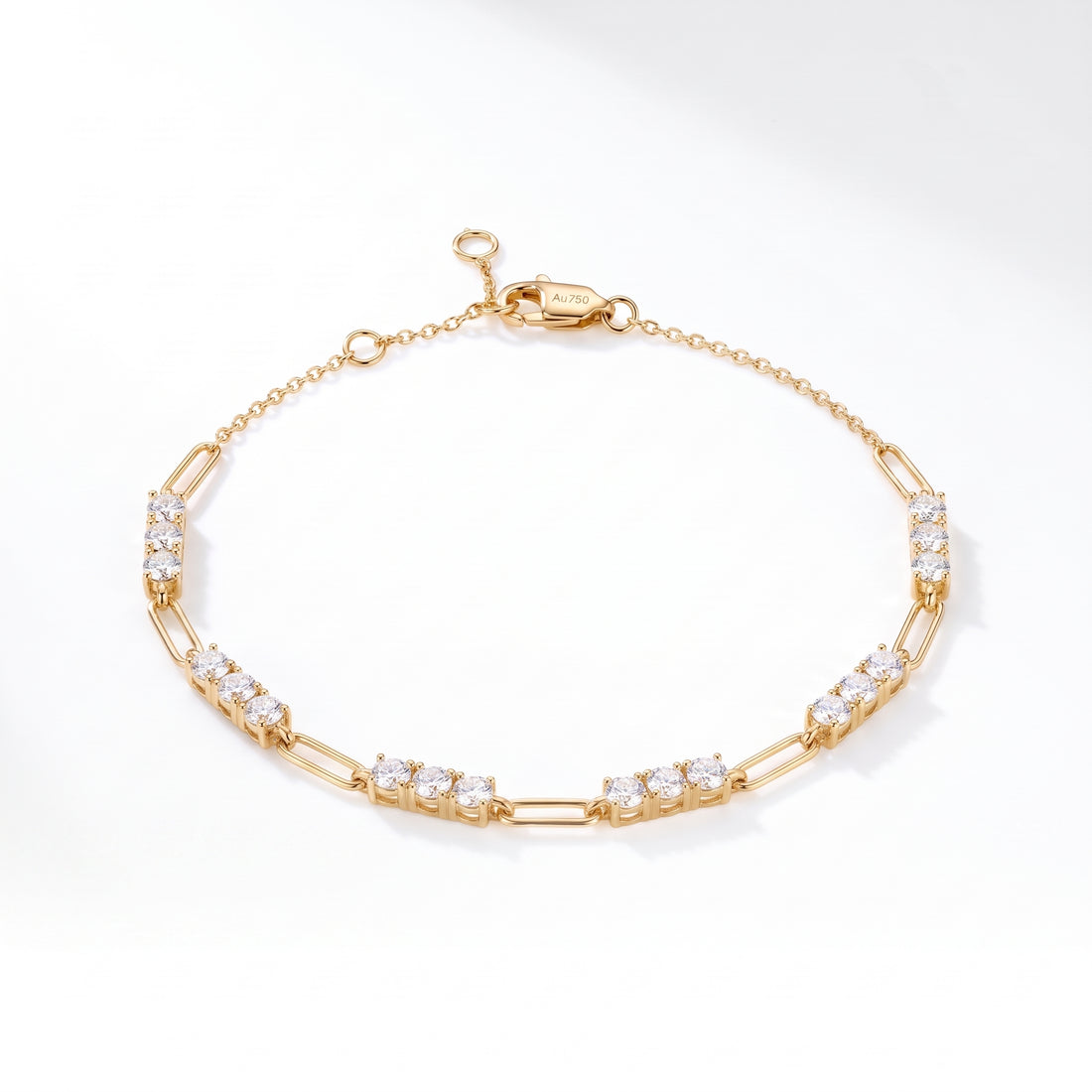 1.8ctw lab-grown diamond bracelet in solid gold, with clustered round diamond stations on elongated paperclip links, shown in yellow gold with a lobster clasp and extender chain